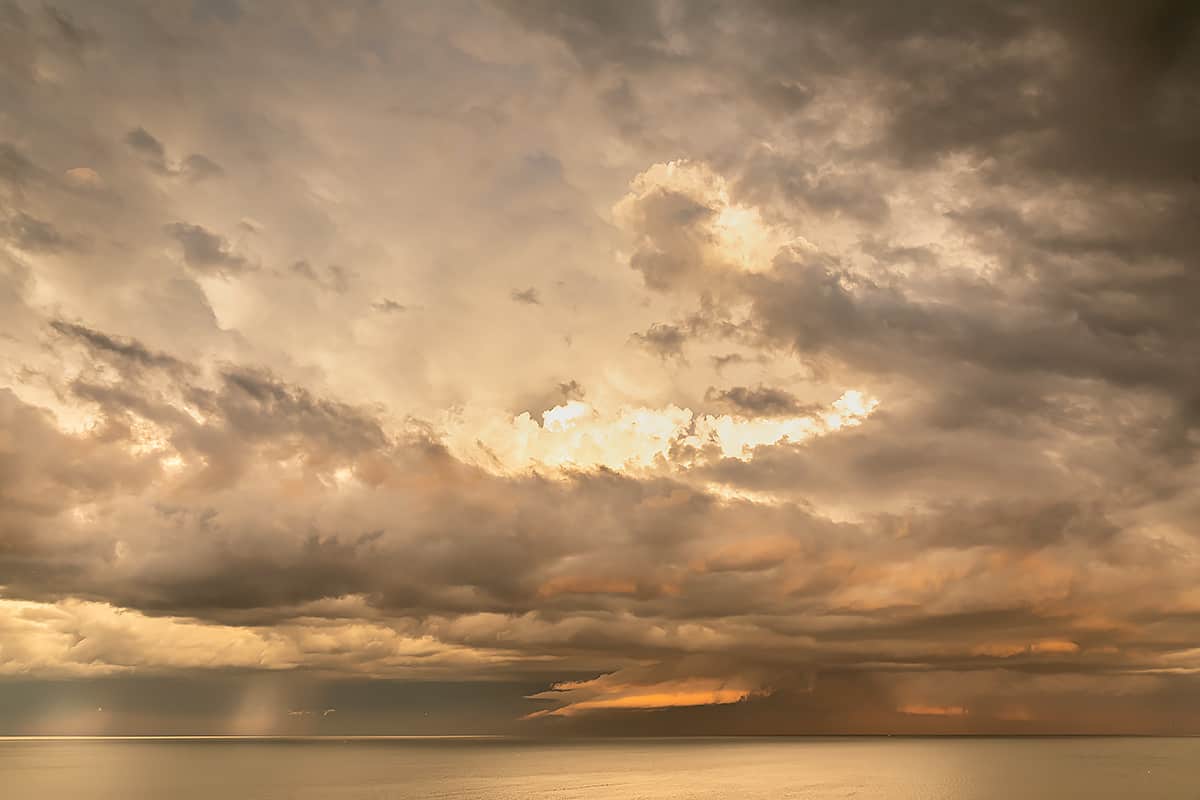 Beautiful storm clouds at sunset over Lake Ontario